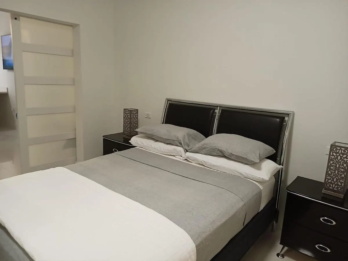 Sky Haven Retreat- 2Br Rooftop Pool, Stunning Views & Free Airport Pickup Falmouth Semesterbostad